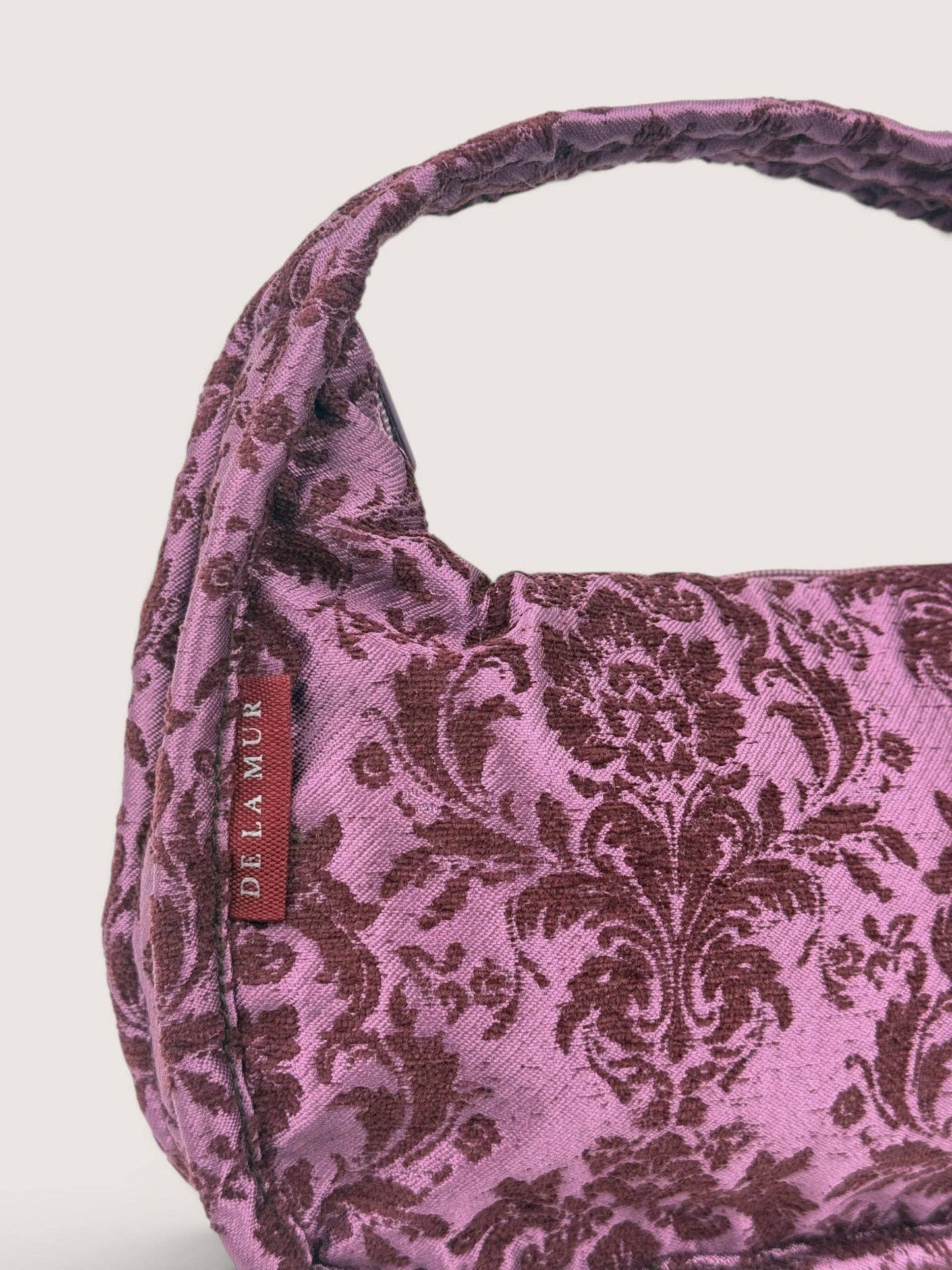 De La Mur – ovale Abendtasche in Violett
