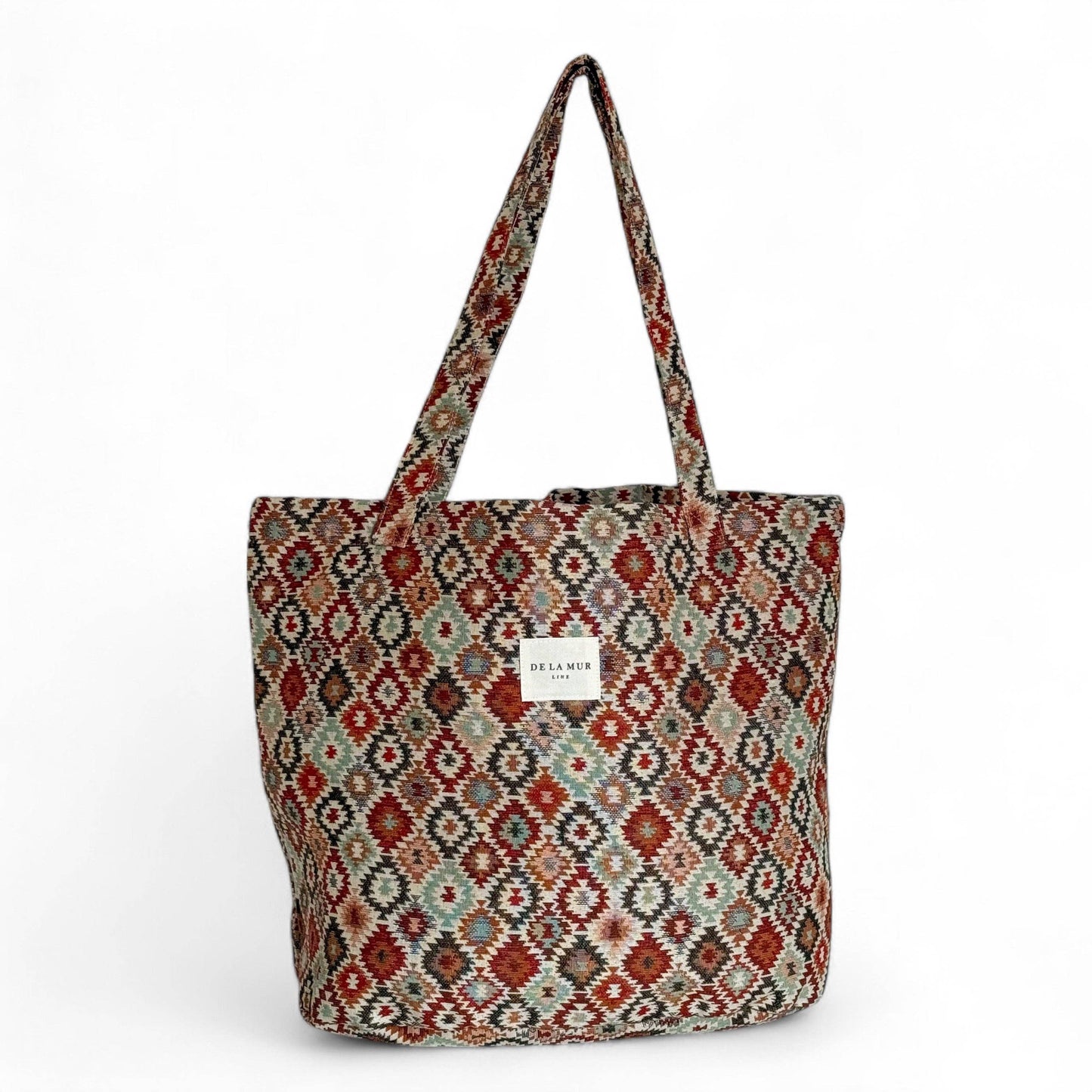 Große Shopper-Tasche Bea von De La Mur mit geometrischem Muster vor weißem Hintergrund