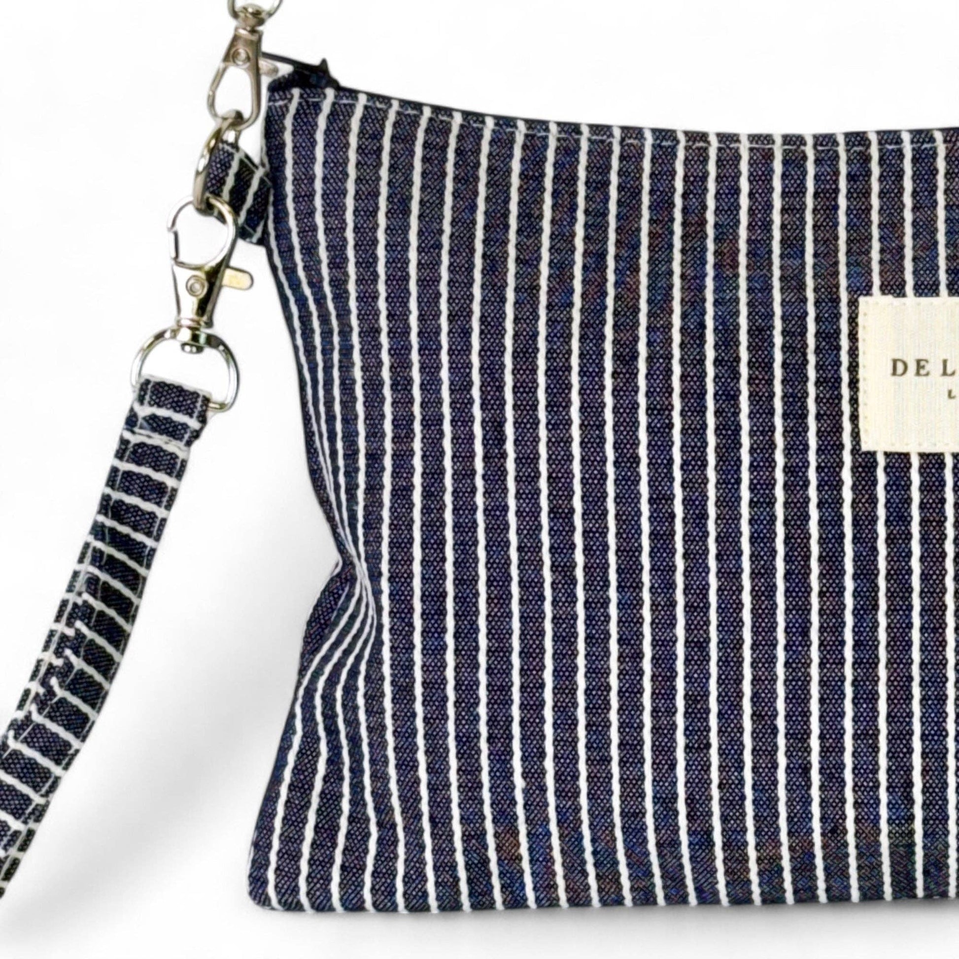 De La Mur Clutch Paola Tasche, Detailaufnahme des Streifenstoffs