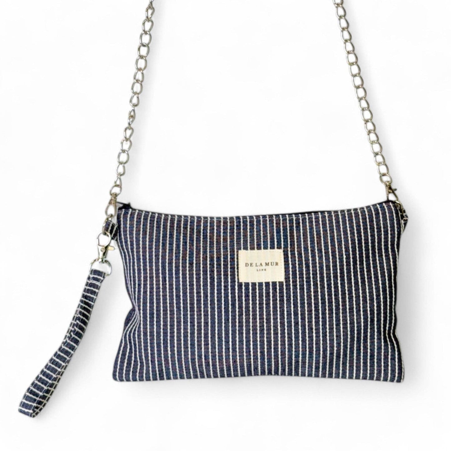 De La Mur Clutch Paola Tasche mit marineblauem Streifenmuster, Frontansicht