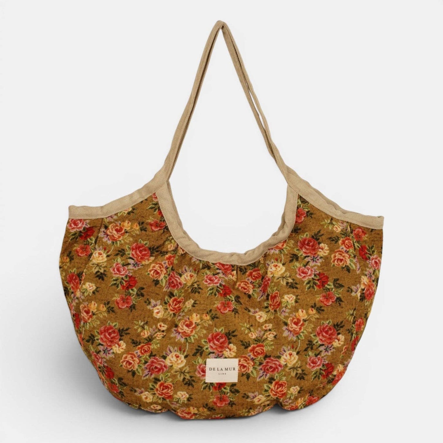 De La Mur Esme Shopper mit rotem und gelbem Blumenmuster auf senfgelbem Grund, beiger Paspel und Schulterhenkeln