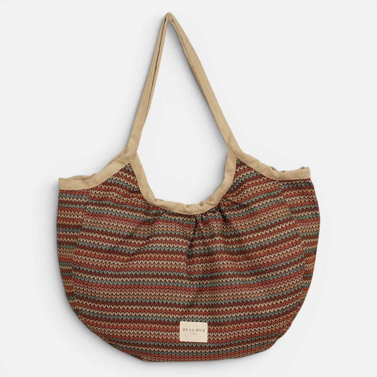 De La Mur Fron Paspeltasche aus mehrfarbigem geometrischem Jacquard mit beigefarbenen Schultergriffen
