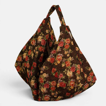 De La Mur Pepi Cookie Schultertasche mit rotem und gelbem Blumenmuster auf braunem Grund

