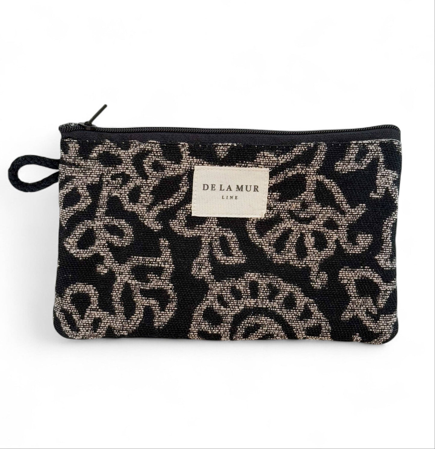 De La Mur Teide Mini-Kosmetiktasche mit beigem Blumenmuster auf Schwarz