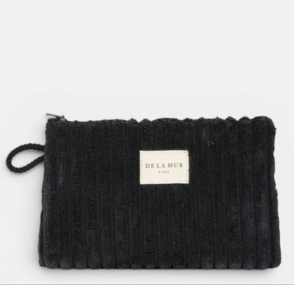 Mini-Kosmetiktasche Curly von De La Mur aus schwarzem Breitcord mit schwarzer Seitenschlaufe
